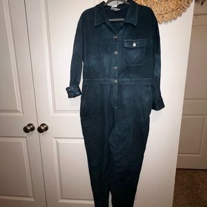 Dark teal coveralls with elastic waistband.